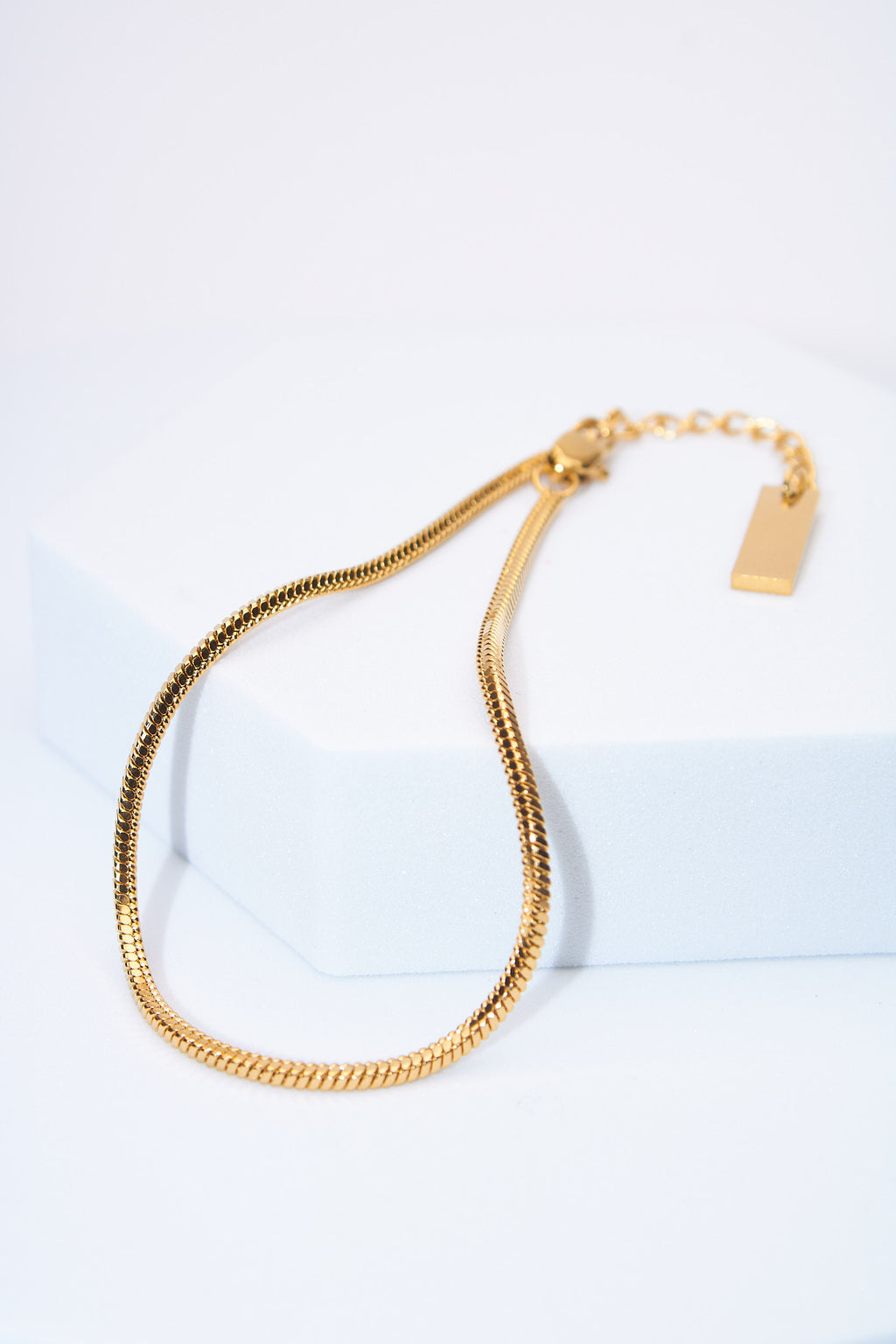 Pulsera cadena serpiente dorada — extensión ajustable