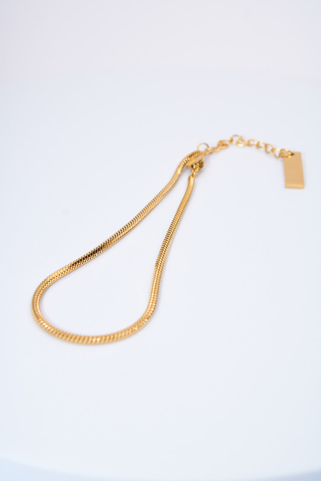 Pulsera cadena serpiente dorada — extensión ajustable