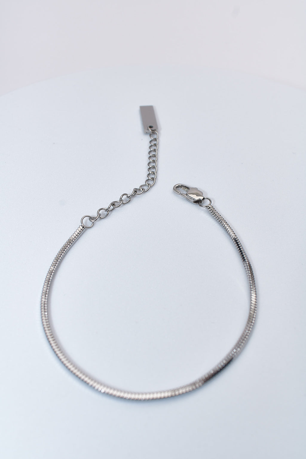 Pulsera cadena serpiente plateada — extensión ajustable