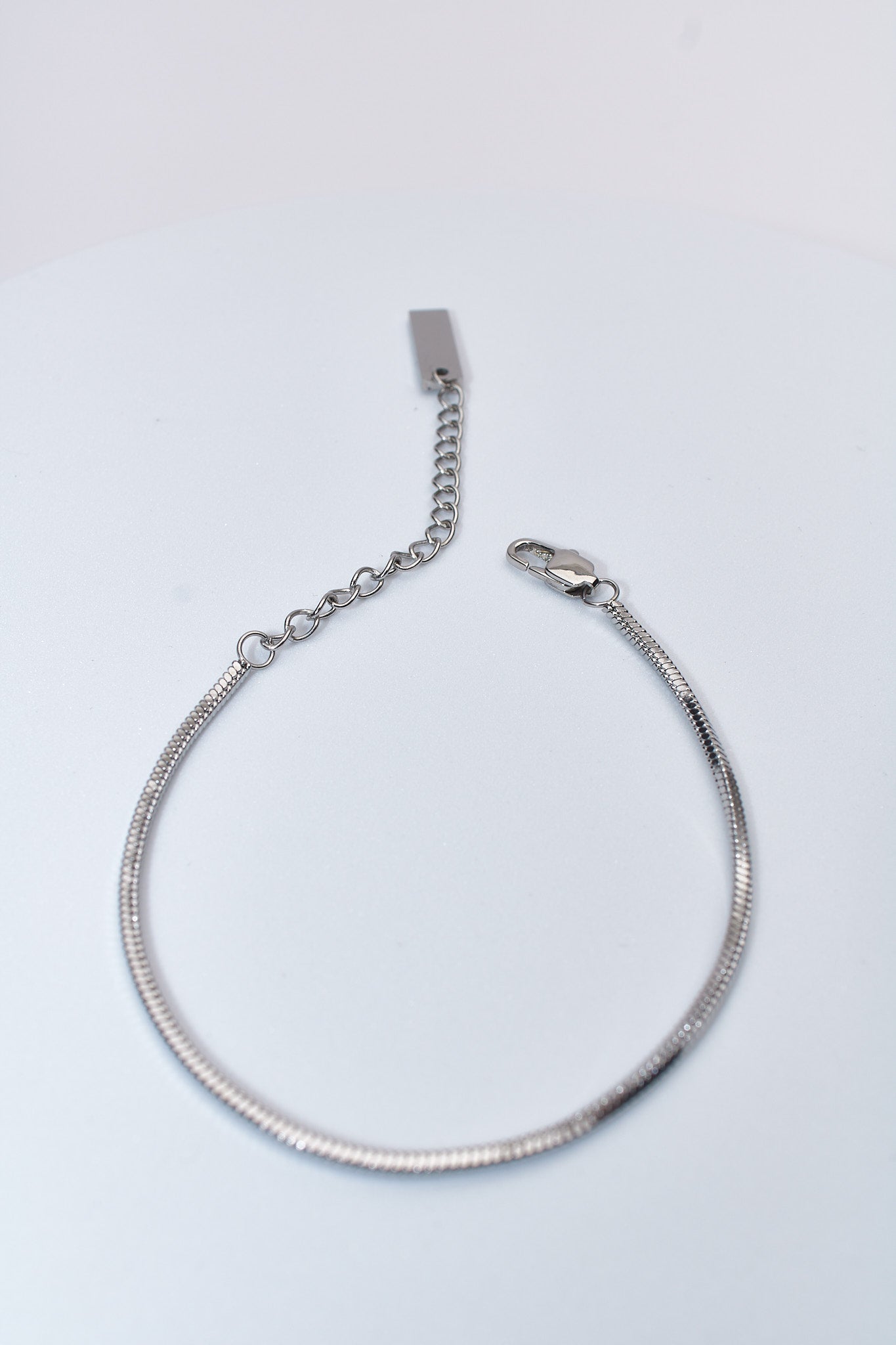 Pulsera cadena serpiente plateada — extensión ajustable