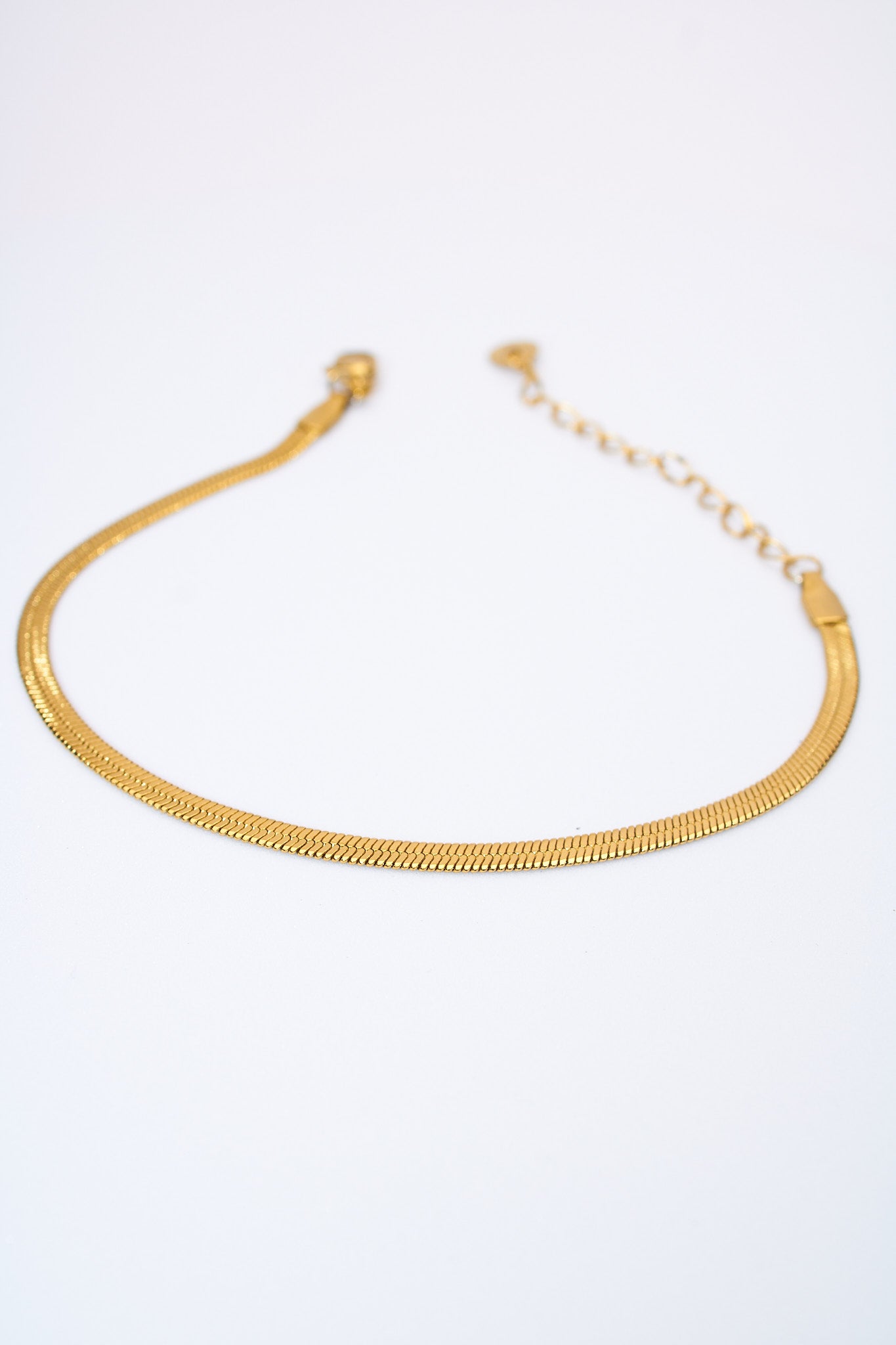 Pulsera serpiente dorada — ajustable con extensión