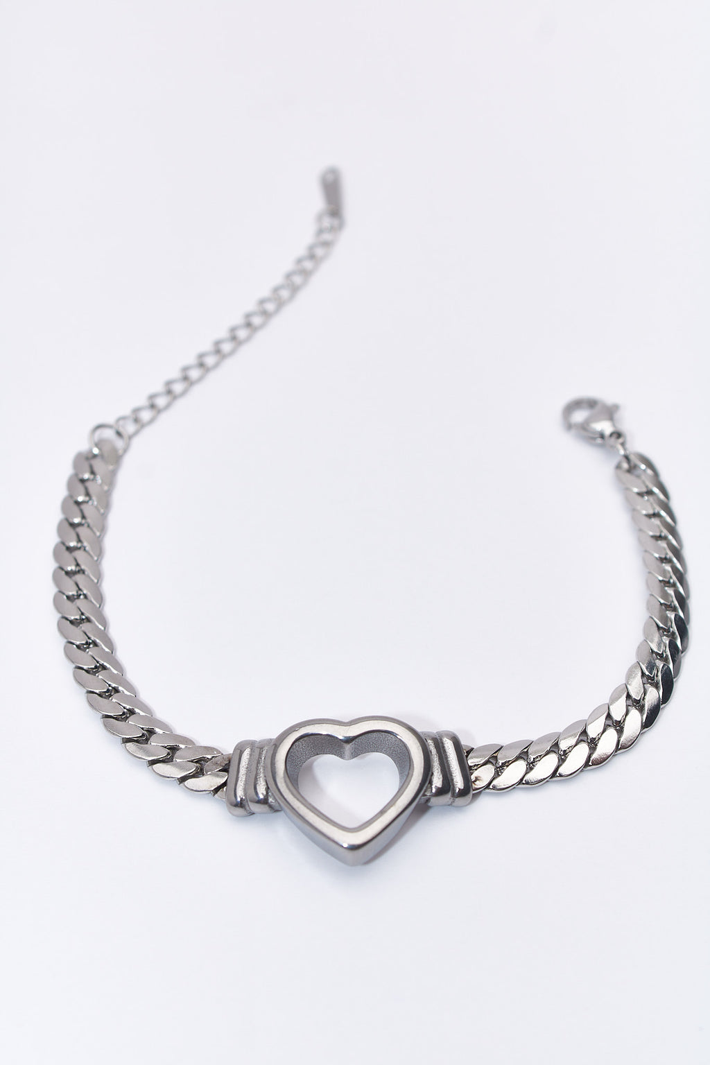 Pulsera eslabón con corazón hueco plateado