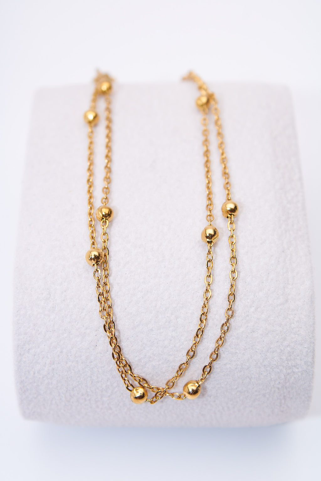 Pulsera doble capa con bolitas móviles — baño dorado