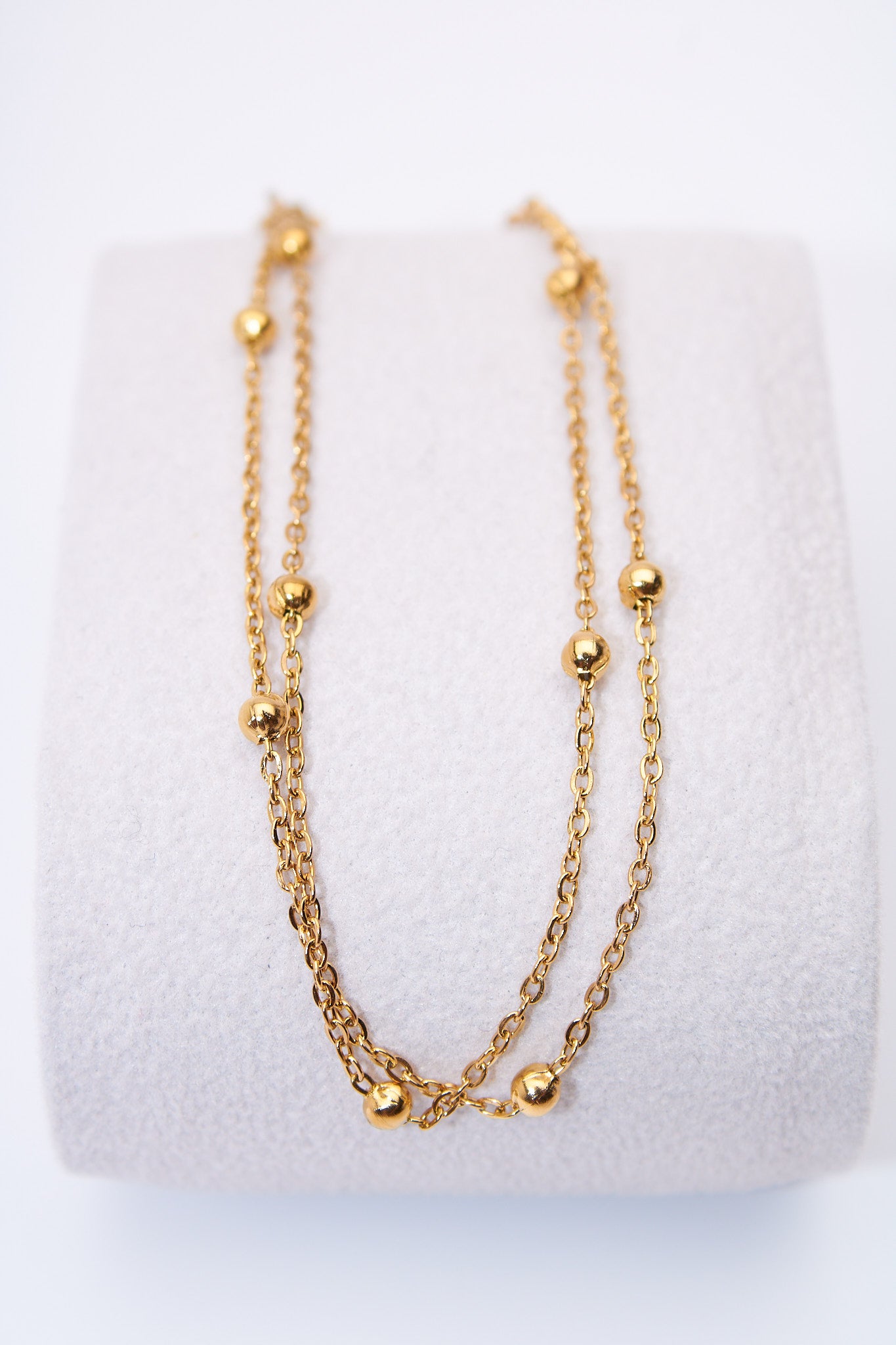 Pulsera doble capa con bolitas móviles — baño dorado