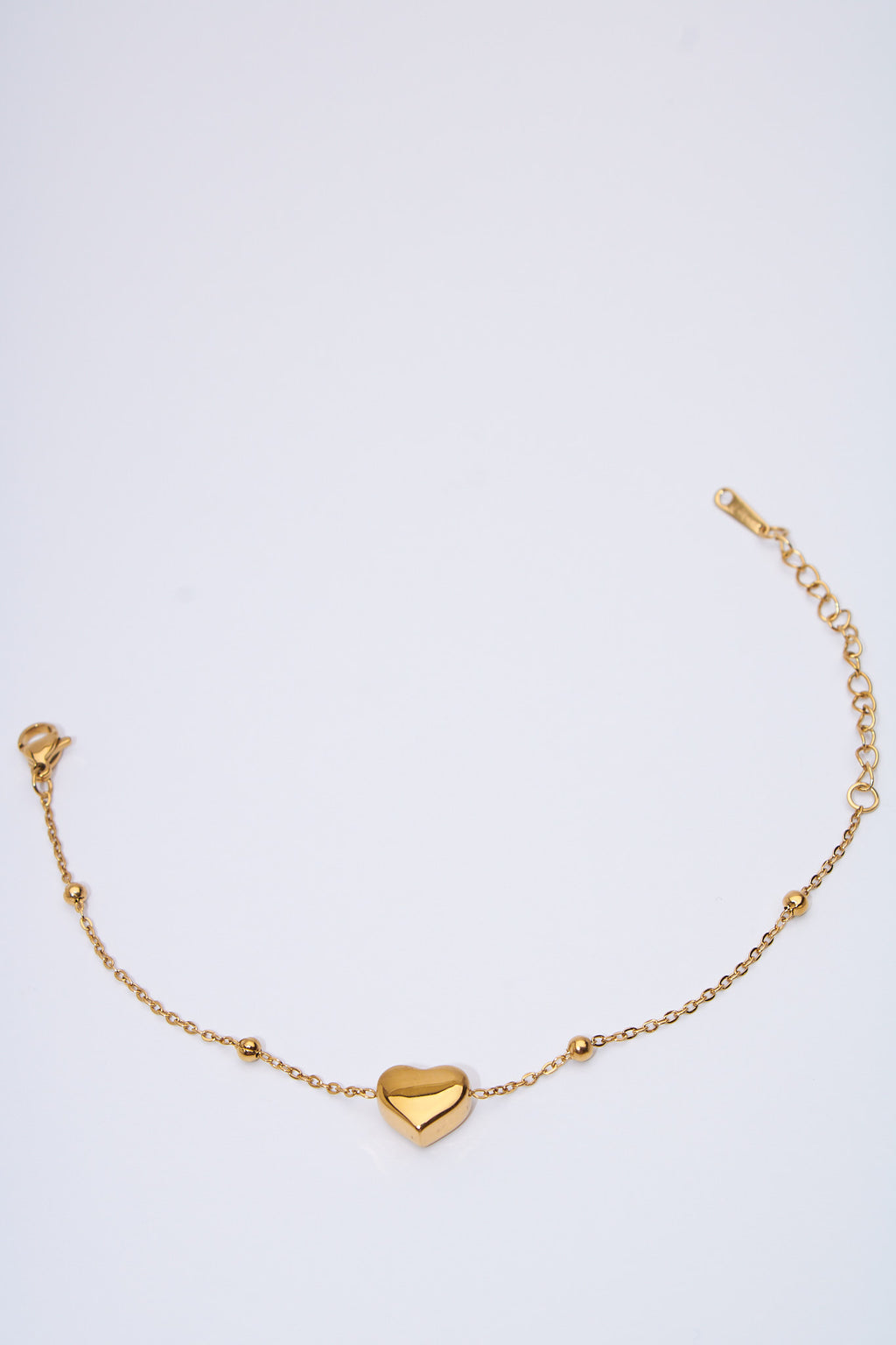 Pulsera corazón macizo dorado — baño dorado