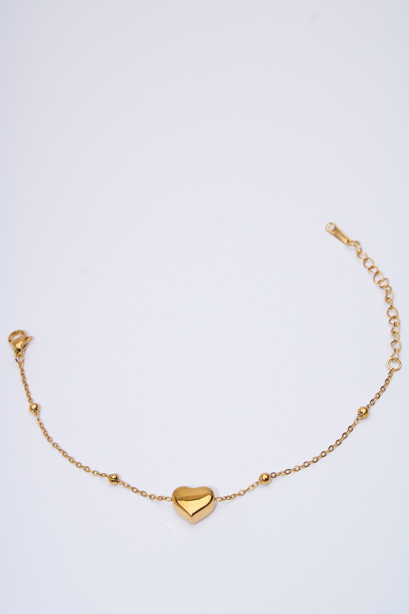 Pulsera corazón macizo dorado — baño dorado