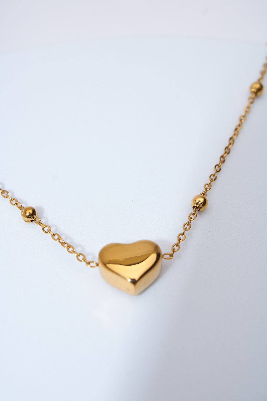 Pulsera corazón macizo dorado — baño dorado