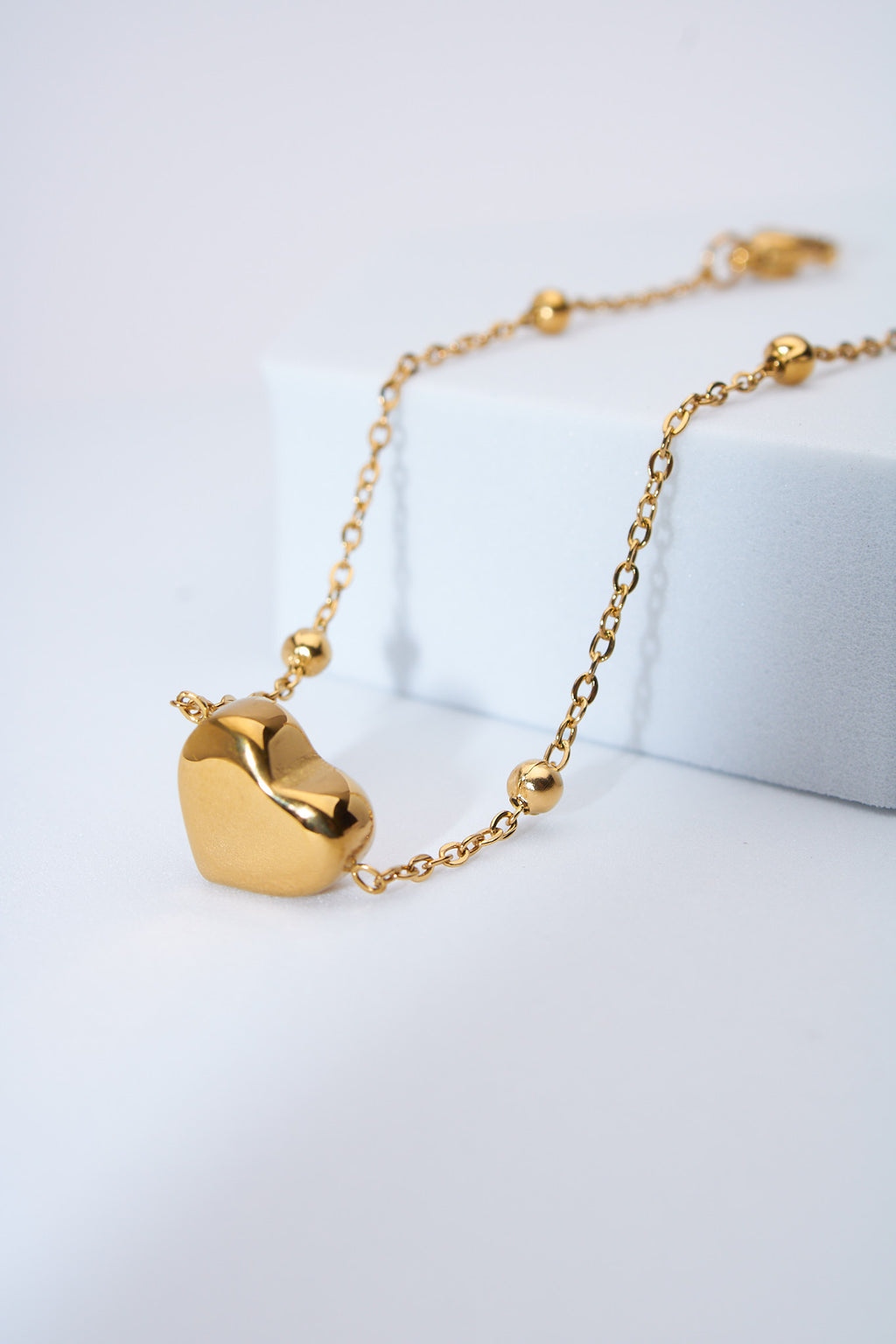 Pulsera corazón macizo dorado — baño dorado