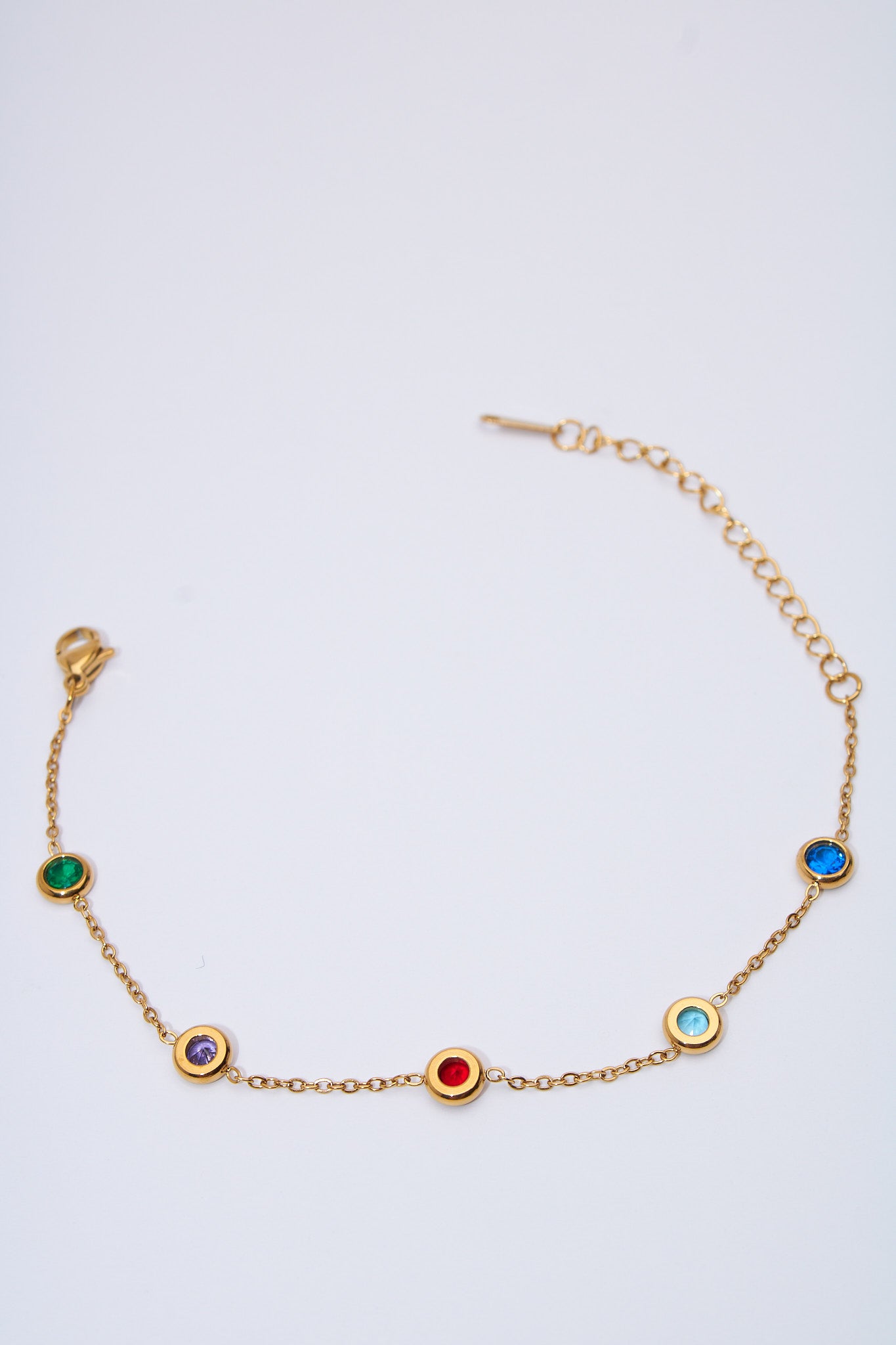 Pulsera con cristales multicolor — baño dorado