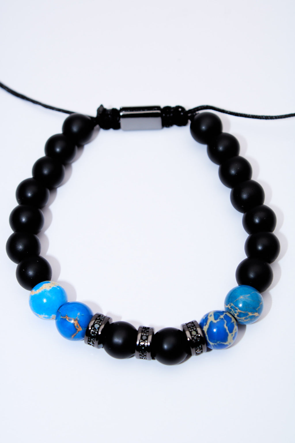 Pulsera de cuentas negras y turquesa con separadores pavé