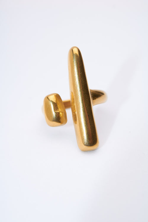 Anillo abierto barra y gota dorado — ajustable, acabado pulido