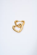 Aretes corazón hueco dorados — acabado pulido