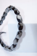 Pulsera ajustable cuentas hematita facetada