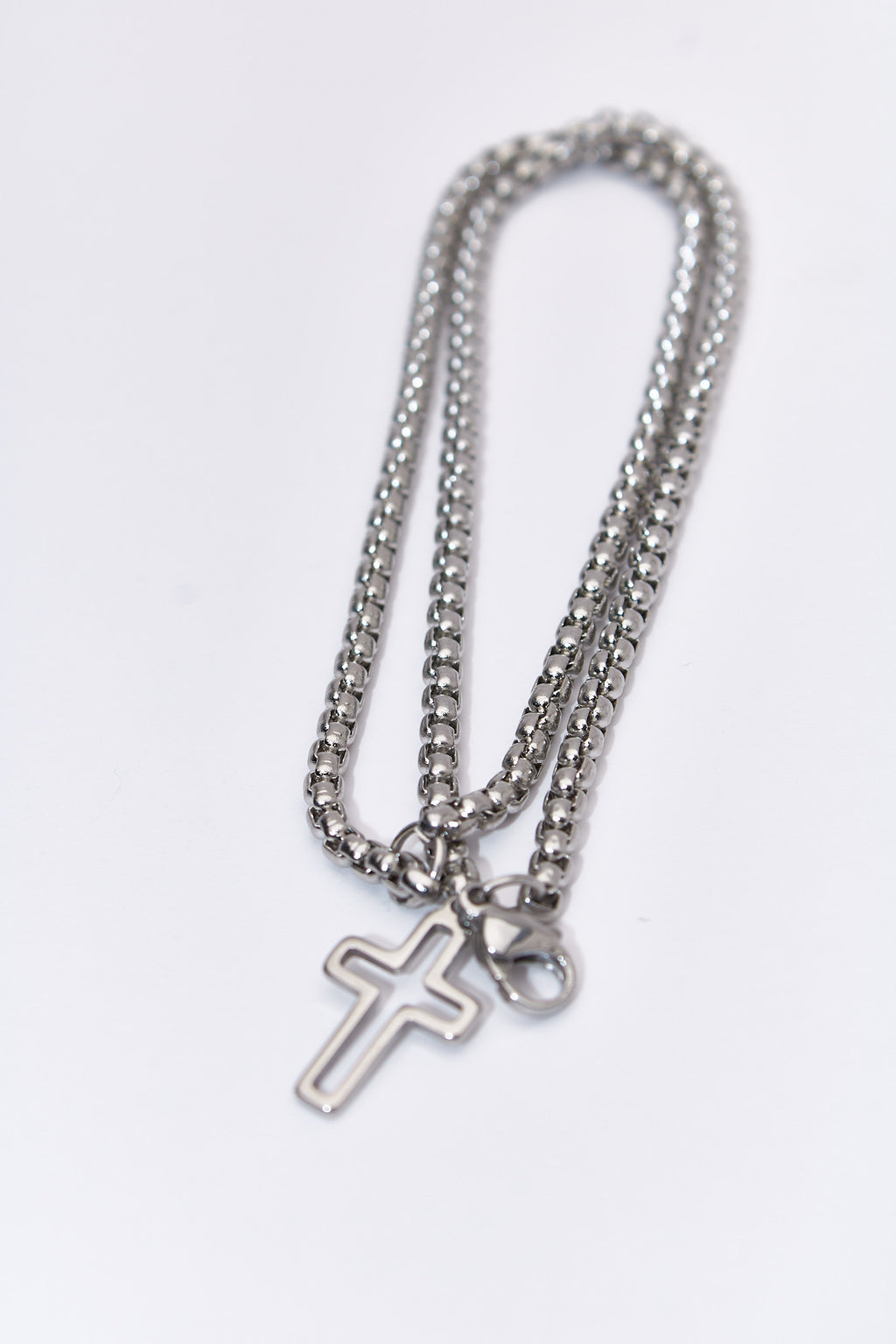 Pulsera doble capa con cruz hueca