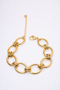 Pulsera eslabón oval con aros anudados — baño dorado